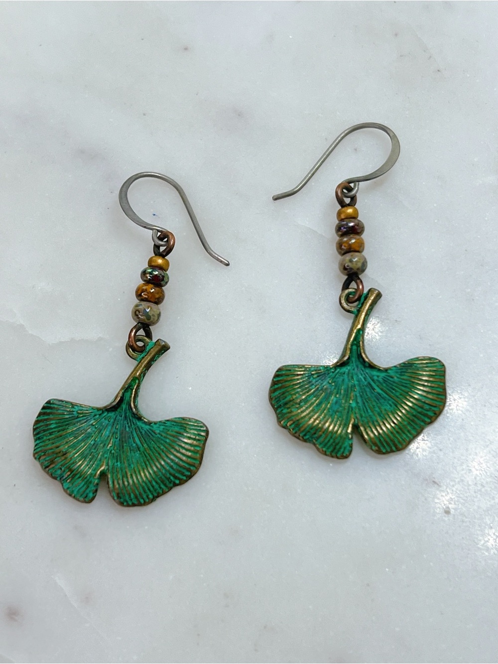 Vintage gingo green patina antique gold beads silver hook 2” earrings